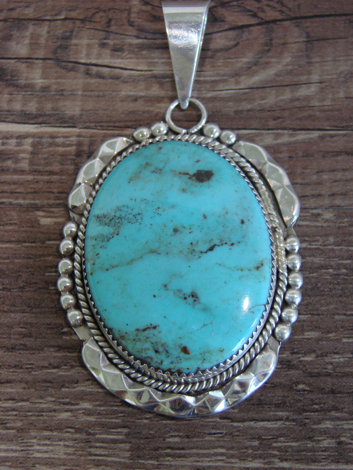 Native American Sterling Silver & Turquoise Pendant by Calavaza
