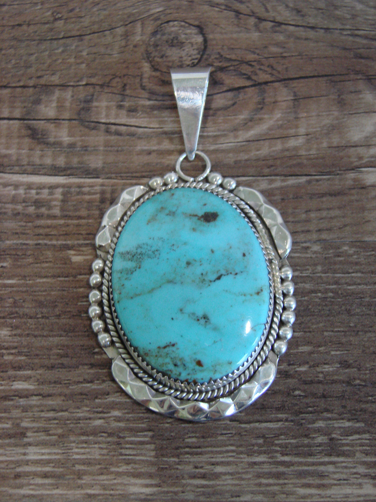 Native American Sterling Silver & Turquoise Pendant by Calavaza