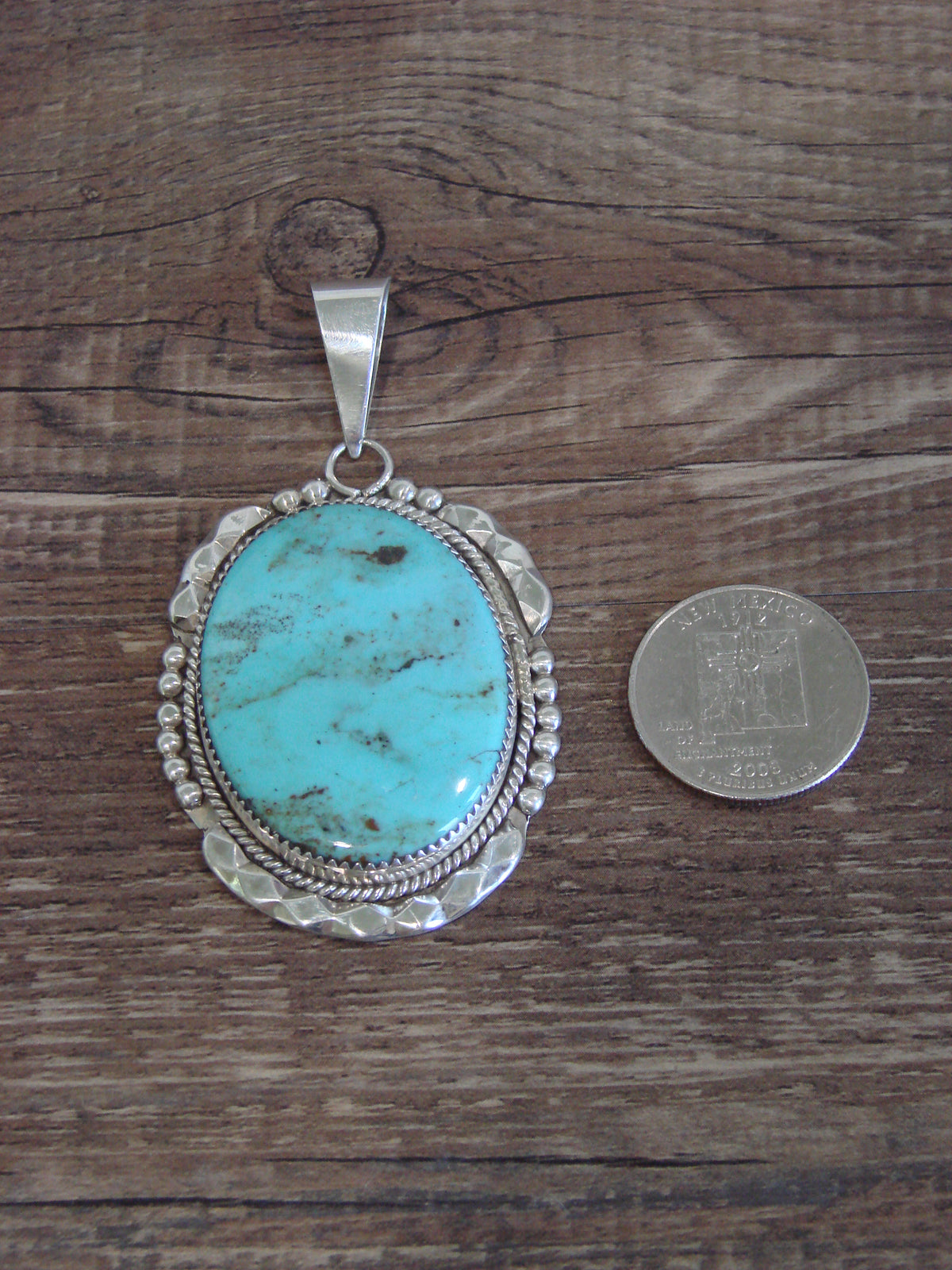 Native American Sterling Silver & Turquoise Pendant by Calavaza